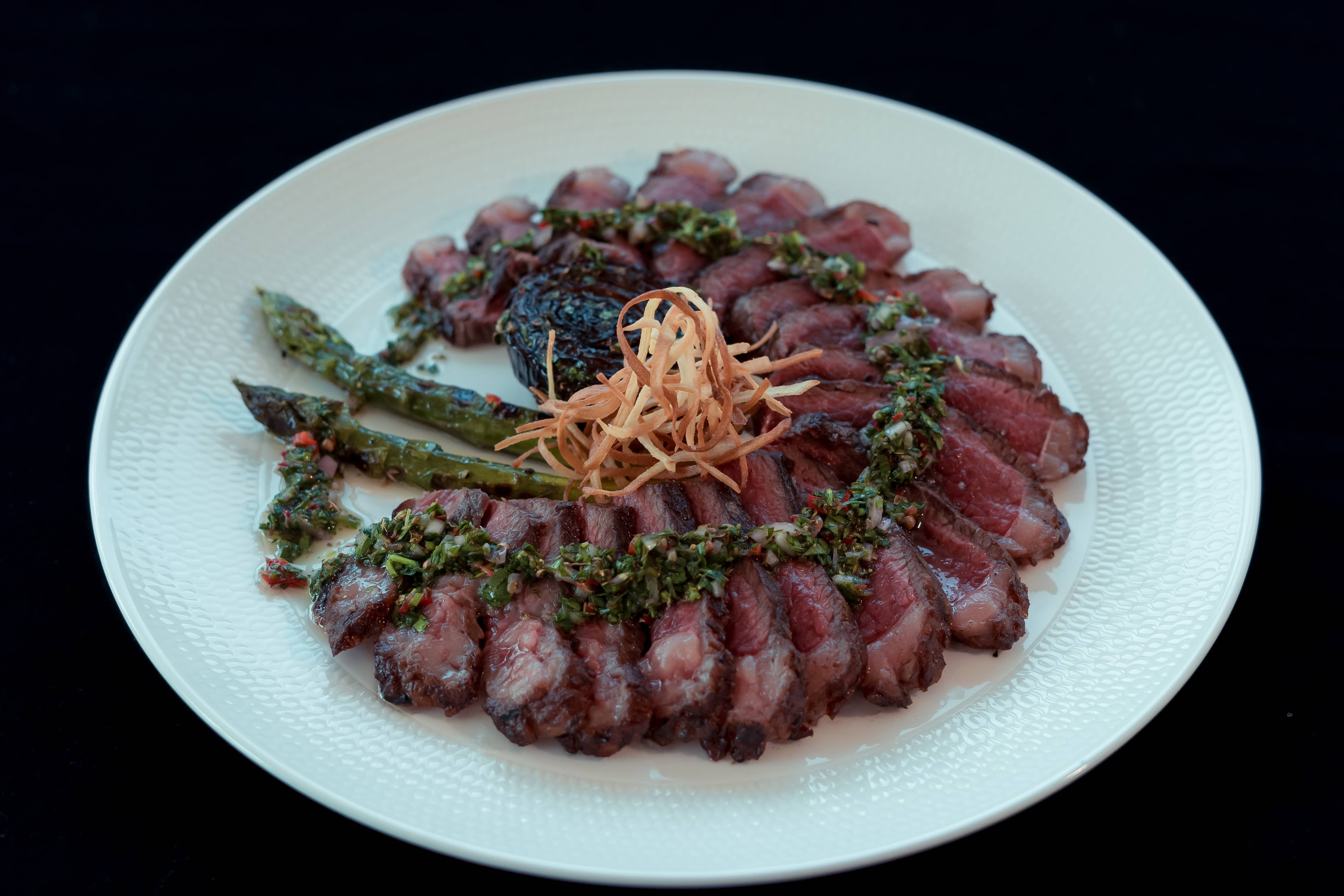 Grilled Picanha , Burnt Onion, Charred Asparagus & Chimichurri